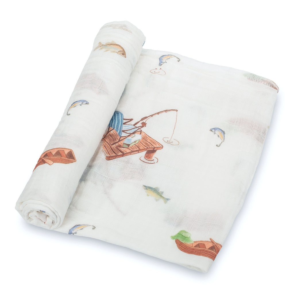 Close-Up View: Detailed Go Fishing Design on 100% Muslin Cotton Swaddle Blanket - 47" x 47", showcasing the serene lakeside scene with a boat, fishing pole, and playful fish.