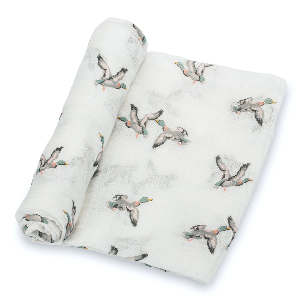 Close-Up View: Adorable Mallard Duck Design on 100% Muslin Cotton Swaddle Blanket - 47" x 47", showcasing the charming duck pattern and the soft fabric texture.