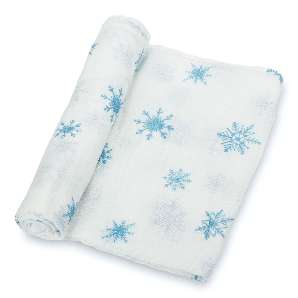 Close-Up View: Exquisite Snowflake Design on 100% Muslin Cotton Swaddle Blanket - 47" x 47", showcasing the intricate pattern and the soft fabric texture.